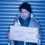 Homeless Young Boy Holding a&nbsp;Sign