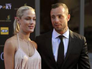 South African Olympic athlete Oscar Pistorius and Reeva Steenkamp attend an awards ceremony in Johannesburg, South Africa last November.(Photo: Lucky Nxumalo, AP)