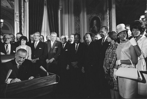 President Lyndon Johnson signs the Voting Rights Act, 1965