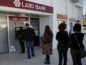 Lines formed at ATMs in Cyprus after news of bank levy broke