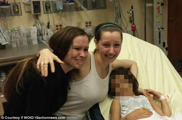 Amanda Berry with her sister and child who was rescued with her.