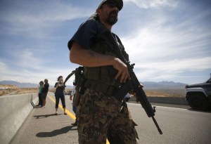 Armed supporters of Cliven Bundy wield weapons against Federal agents.