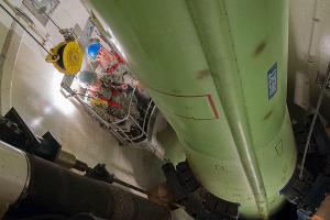 Air Force Chief of Staff Gen. Mark Welsh, right, and Tech. Sgt. Justin Richie riding in a work cage at Malmstrom Air Force Base, Mont.