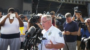 Ferguson Police Chief Thomas Jackson announces the name of Officer Darren Wilson as the man who shot and killed Michael Brown, 18, last Saturday.