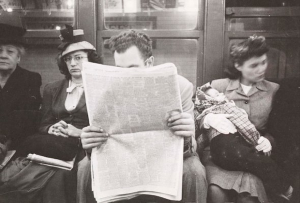 man-reading-newspaper