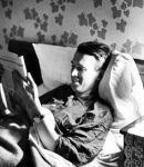 jimmy stewart reads in&nbsp;bed