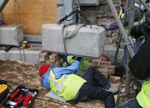Massachusetts officials worked to remove a time capsule in the cornerstone of the State House in Boston, on Dec. 11, 2014 (h/t The Boston Globe).
