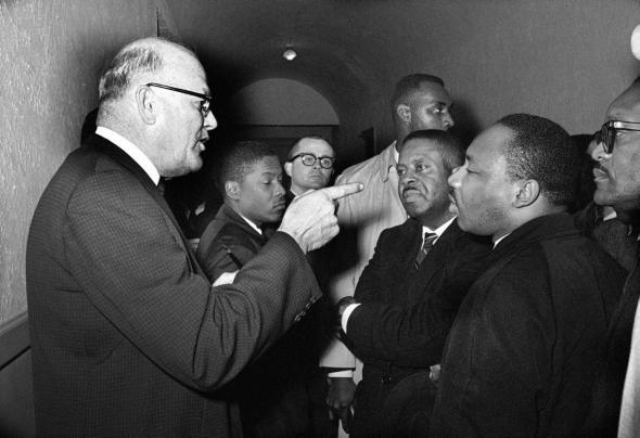March 1, 1965, Registrar Carl Golson shakes finger in MLK's face saying that voter registration in Lowndes Cty is none of his business.