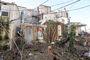 Baltimore, Md -- 12/2/11 -- The rear of a vacant house, marked with 