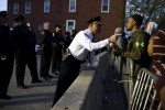 Captain Erik Pecha of the Baltimore Police Department chats with a young demonstrator during a protest against the death in police custody of Freddie Gray in&nbsp;Baltimore