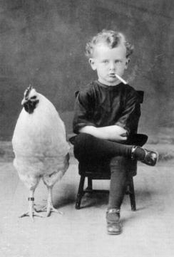 weird-Vintage-photos-kid-smoking-chicken