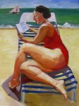 Woman at the beach&nbsp;reading