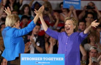 Hillary Clinton after being introduced by Senator Elizabeth Warren at a campaign rally in Cincinnati, Ohio. REUTERS/Aaron Josefczyk