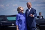 Democratic presidential nominee Hillary Clinton welcomes Vice President Joe Biden as he disembarks from Air Force Two for a joint campaign event in Scranton,&nbsp;Pennsylvania