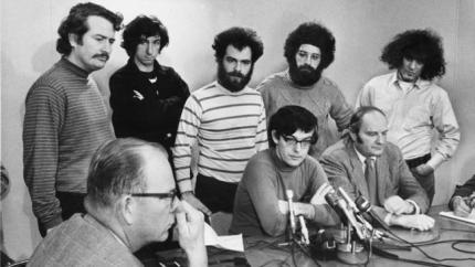 Defendants in the Chicago Seven conspiracy trial hold a news conference in Chicago on Jan. 5, 1970. Standing are, from left, John Froines, Tom Hayden, Jerry Rubin, Lee Weiner and Abbie Hoffman. Seated are Rennie Davis, center, and David Dellinger. (Chicago Tribune)