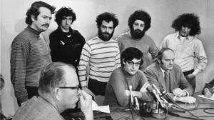 Defendants in the Chicago Seven conspiracy trial hold a news conference in Chicago on Jan. 5, 1970. Standing are, from left, John Froines, Tom Hayden, Jerry Rubin, Lee Weiner and Abbie Hoffman. Seated are Rennie Davis, center, and David Dellinger. (Chicago Tribune)