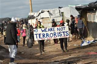 refugees-demonstrating-in-migrant-camp-in-france