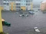 Cars sit on a flooded street on the island of Saint-Martin after Hurricane Irma passed&nbsp;thr