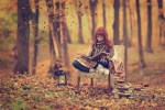 girl-reading-in-fall-woods-1024×685