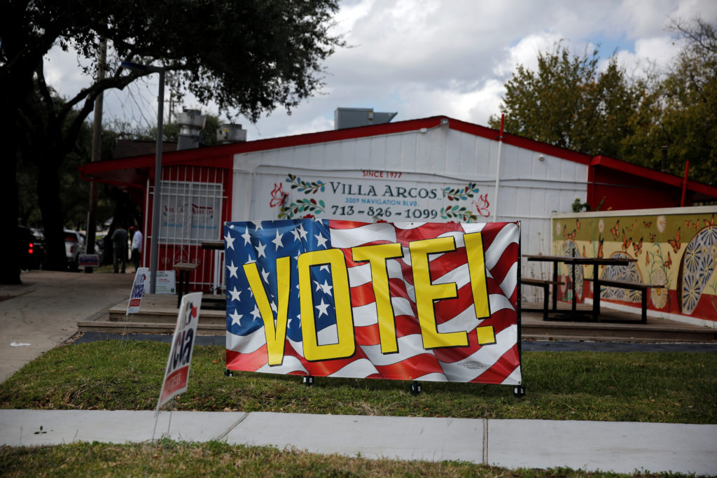 A banner urging people to vote in the midterm elections is displayed in Houston