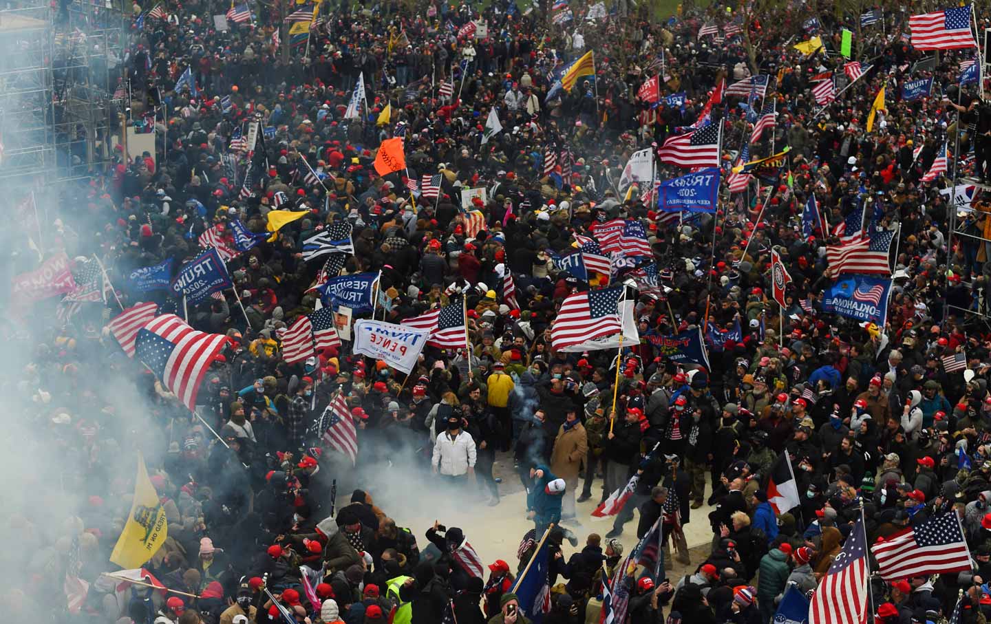 capitol-insurrection-tear-gas-crowd-gty-img