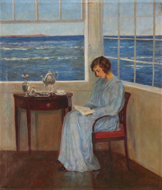 Poul Friis Nybo (Danish 1868-1929) A young woman reading while enjoying a cup of tea in the sunroom by the sea.