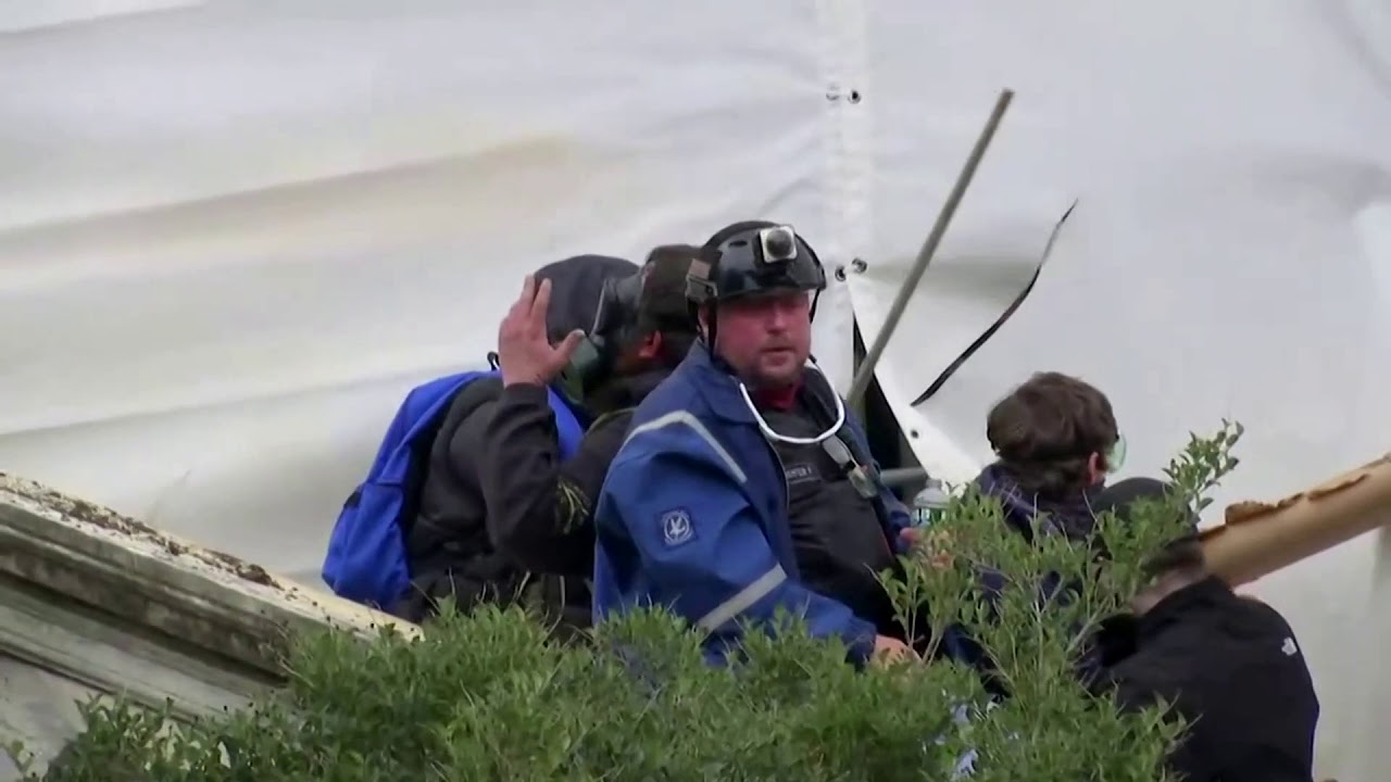 Guy Wesley Reffitt center in helmet